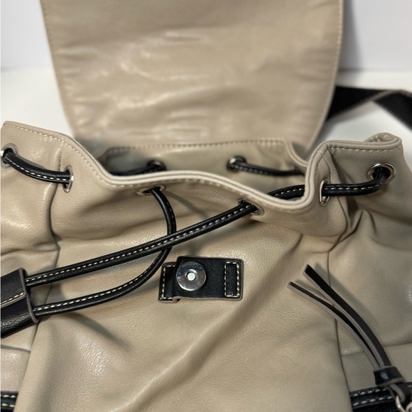 Stylish Tan and Black  Backpack purse in like new condition - Picture 5 of 10